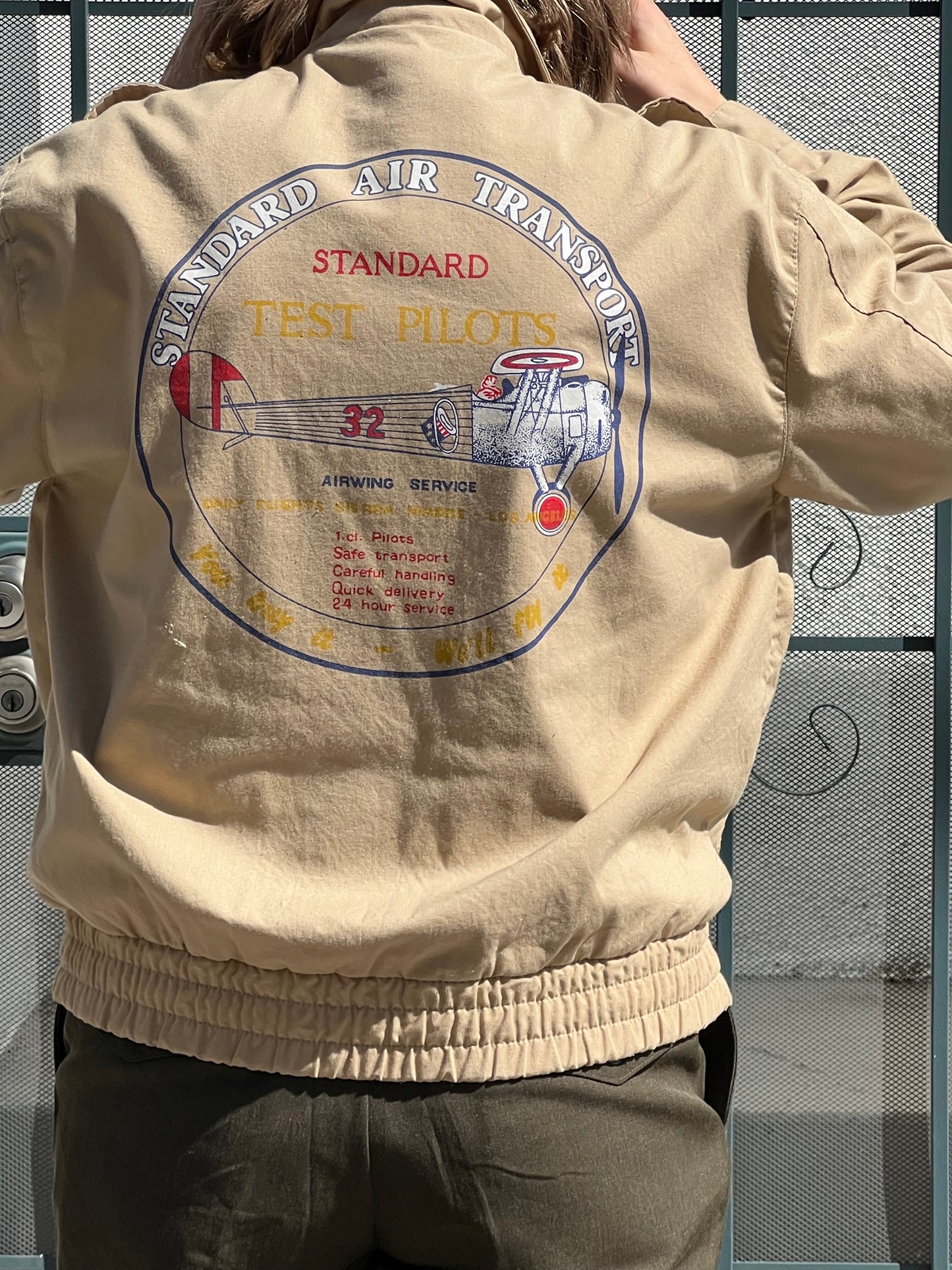 80s Trader Bay khaki flight jacket with back design